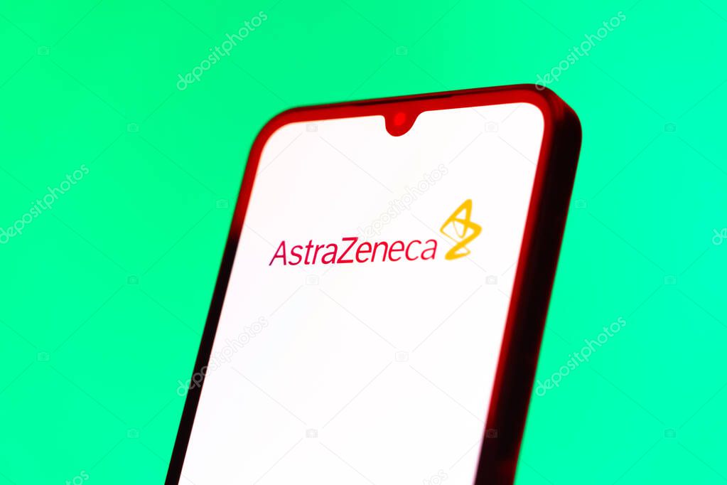 Prague, Czechia - 10 21 2024: Smartphone on surface showing AstraZeneca logo.