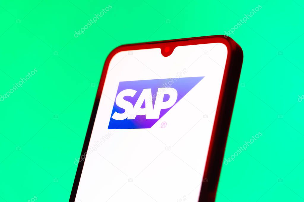 Prague, Czechia - 10 21 2024: Smartphone on surface showing SAP logo.