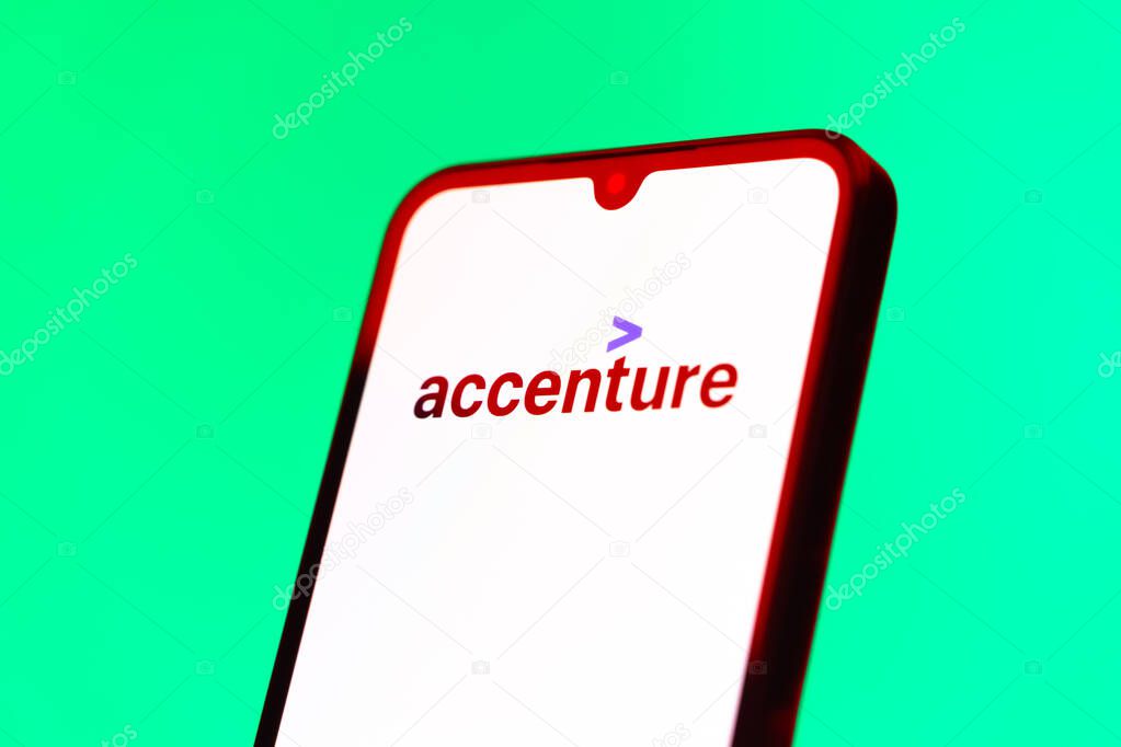 Prague, Czechia - 10 21 2024: Smartphone on surface showing Accenture logo.