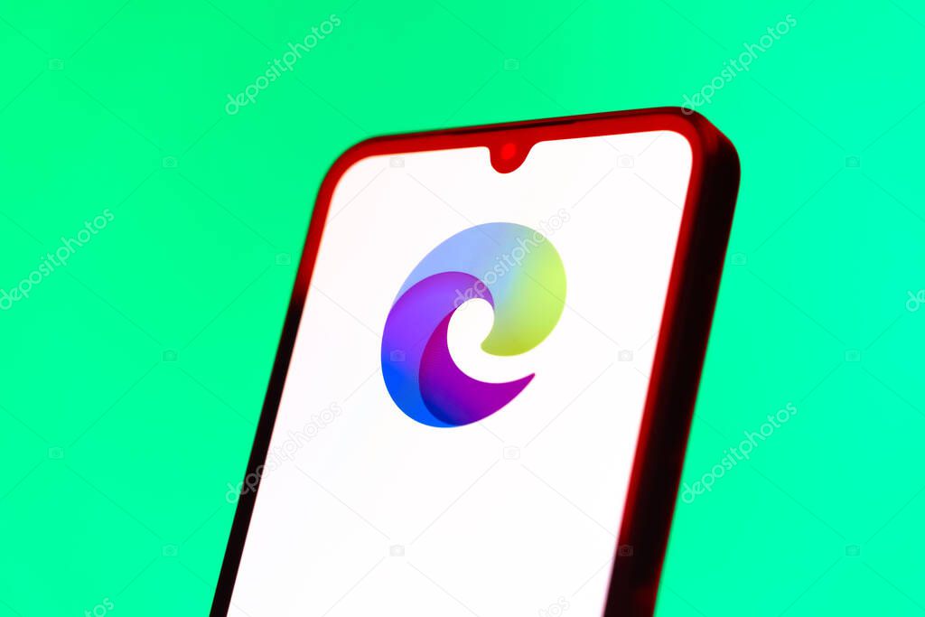 Prague, Czechia - 10 21 2024: Smartphone on surface showing Edge logo.