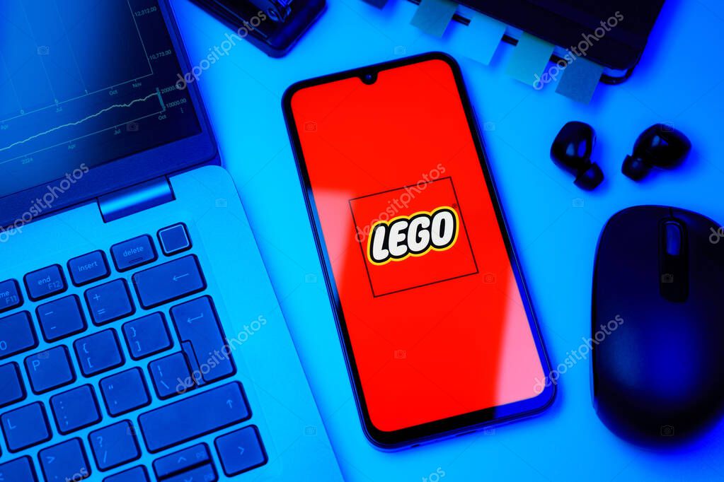 Prague, Czechia - 10 21 2024: Smartphone on surface showing Lego logo.