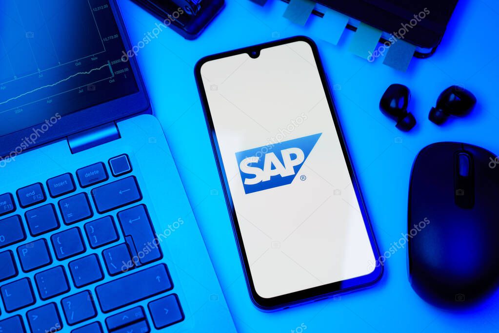 Prague, Czechia - 10 21 2024: Smartphone on surface showing SAP logo.