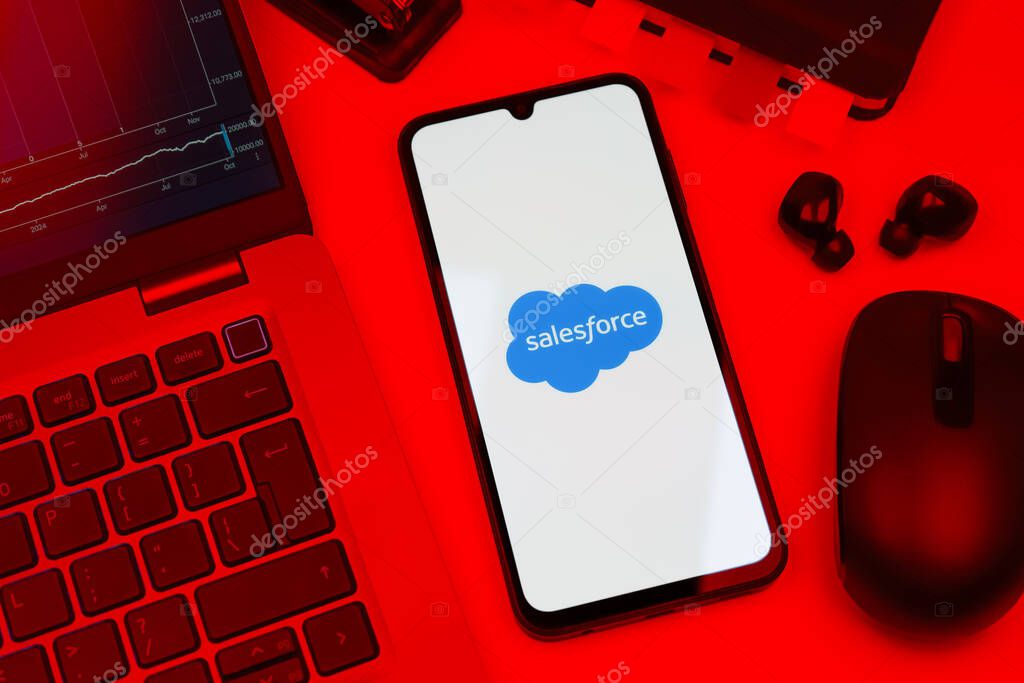 Prague, Czechia - 10 21 2024: Smartphone on surface showing Salesforce logo.
