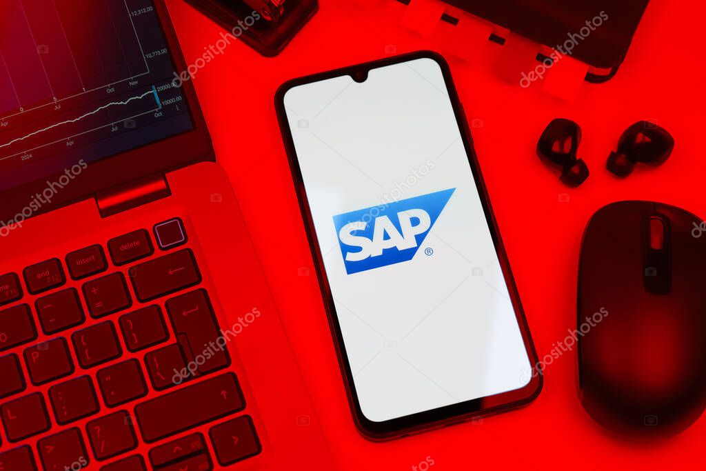 Prague, Czechia - 10 21 2024: Smartphone on surface showing SAP logo.