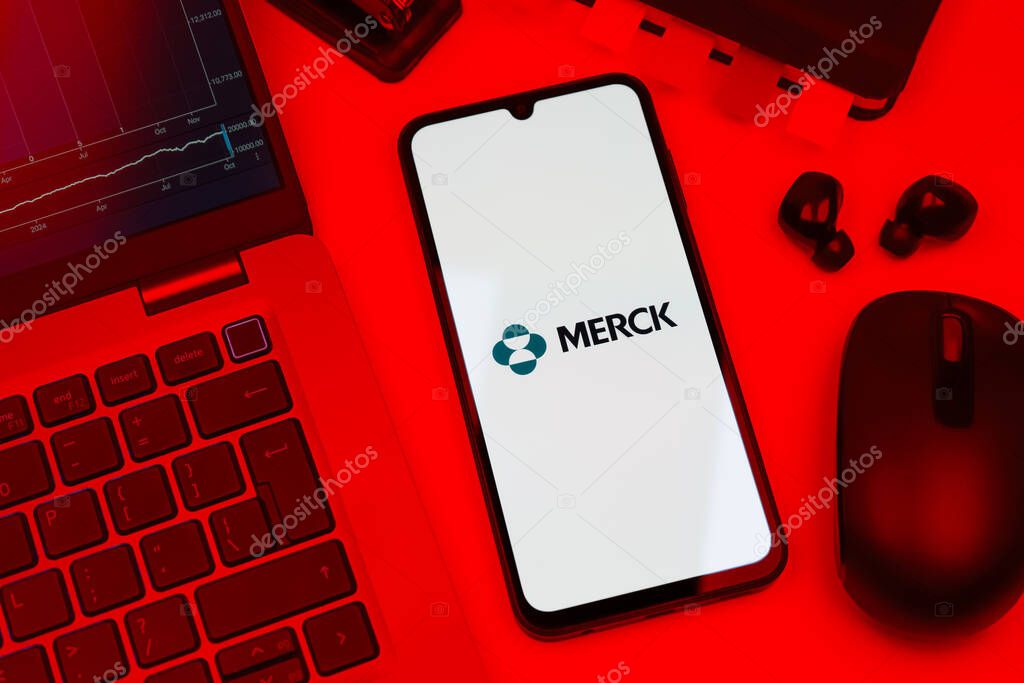 Prague, Czechia - 10 21 2024: Smartphone on surface showing Merck logo.