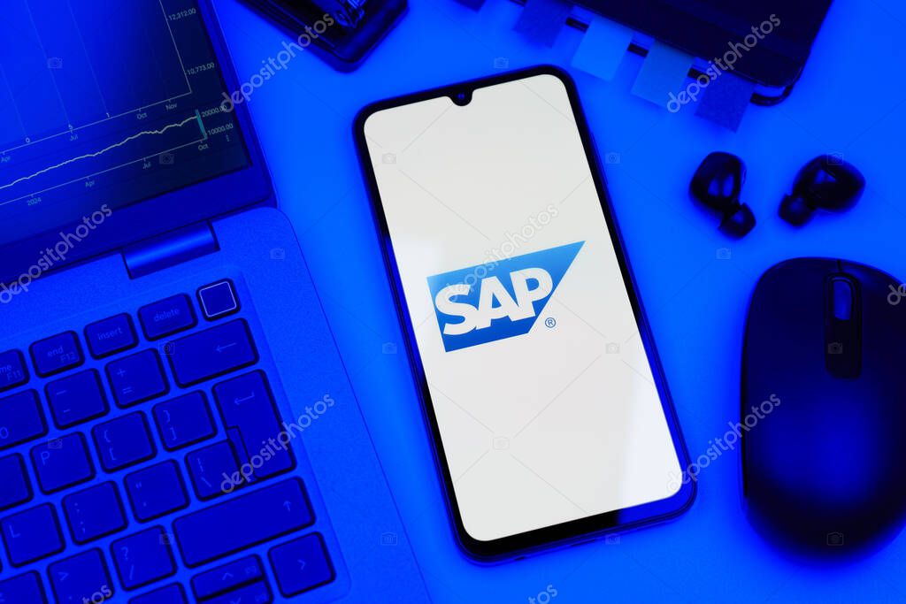 Prague, Czechia - 10 21 2024: Smartphone on surface showing SAP logo.