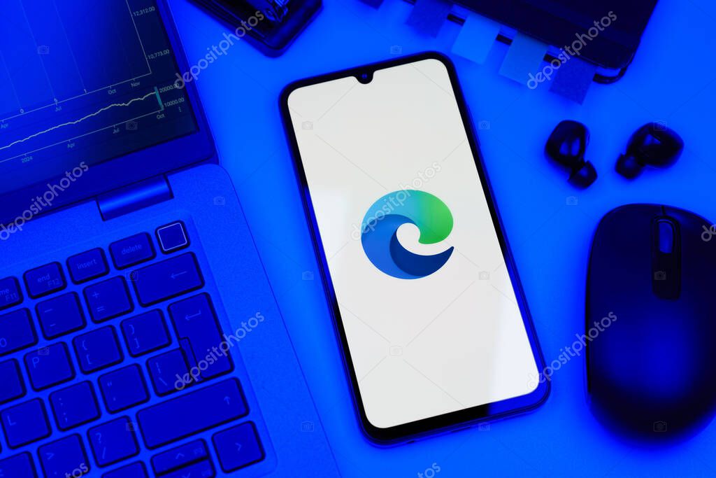 Prague, Czechia - 10 21 2024: Smartphone on surface showing Edge logo.