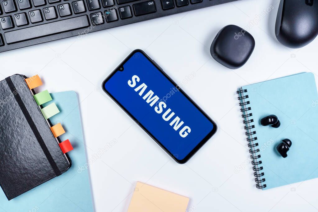 Prague, Czechia - 10 21 2024: Smartphone on surface showing Samsung logo.