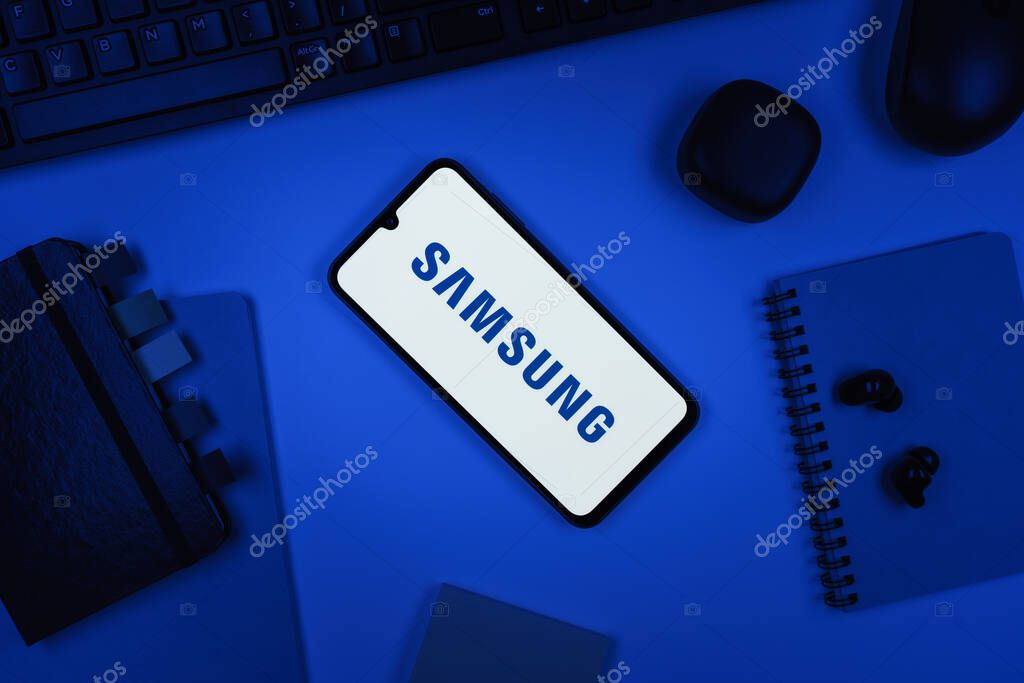 Prague, Czechia - 10 21 2024: Smartphone on surface showing Samsung logo.