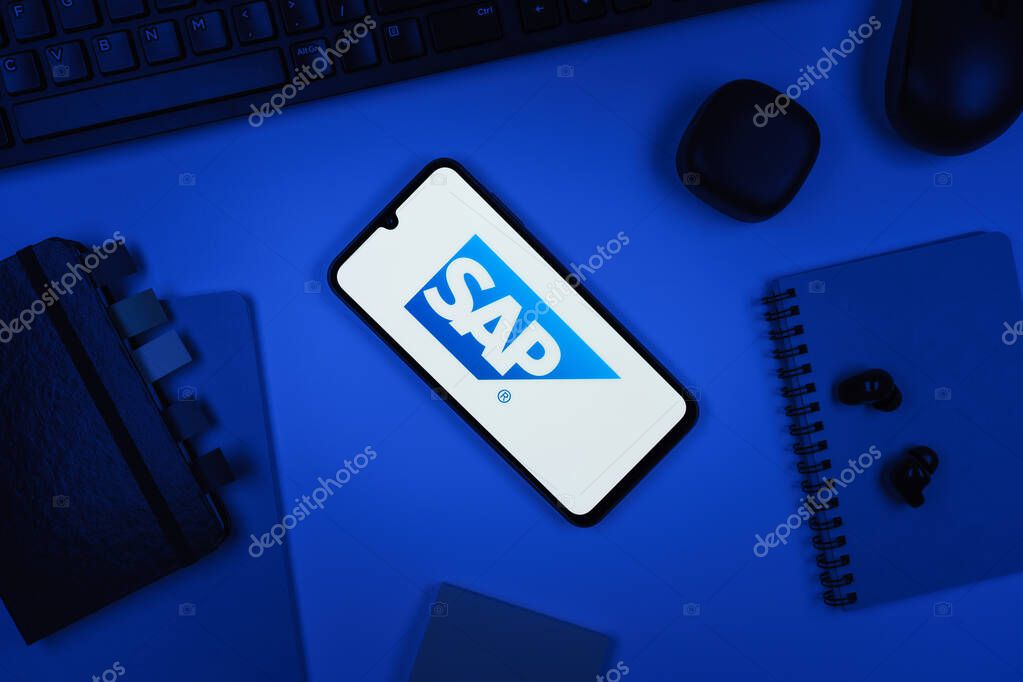 Prague, Czechia - 10 21 2024: Smartphone on surface showing SAP logo.