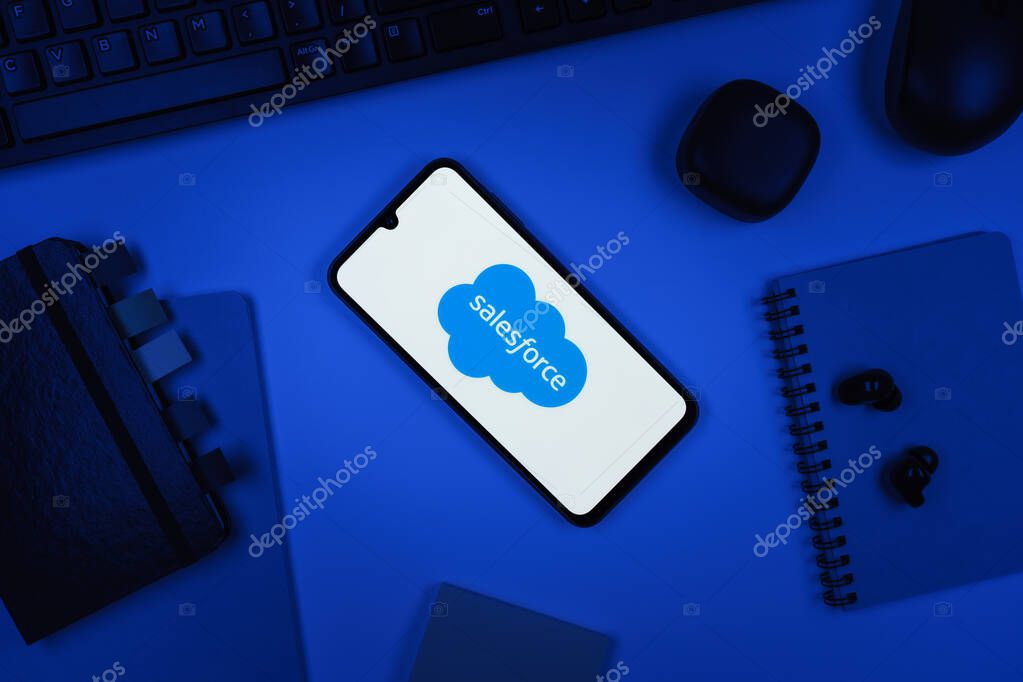 Prague, Czechia - 10 21 2024: Smartphone on surface showing Salesforce logo.
