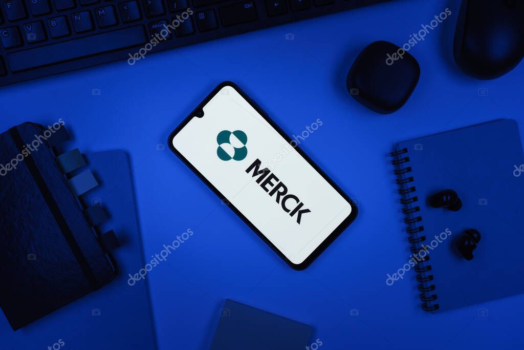 Prague, Czechia - 10 21 2024: Smartphone on surface showing Merck logo.