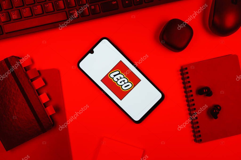 Prague, Czechia - 10 21 2024: Smartphone on surface showing Lego logo.