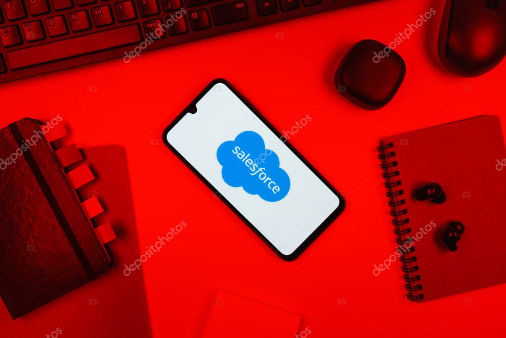 Prague, Czechia - 10 21 2024: Smartphone on surface showing Salesforce logo.