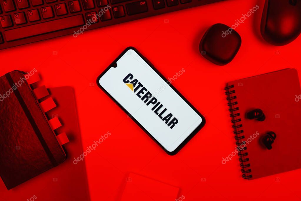 Prague, Czechia - 10 21 2024: Smartphone on surface showing Caterpillar logo.