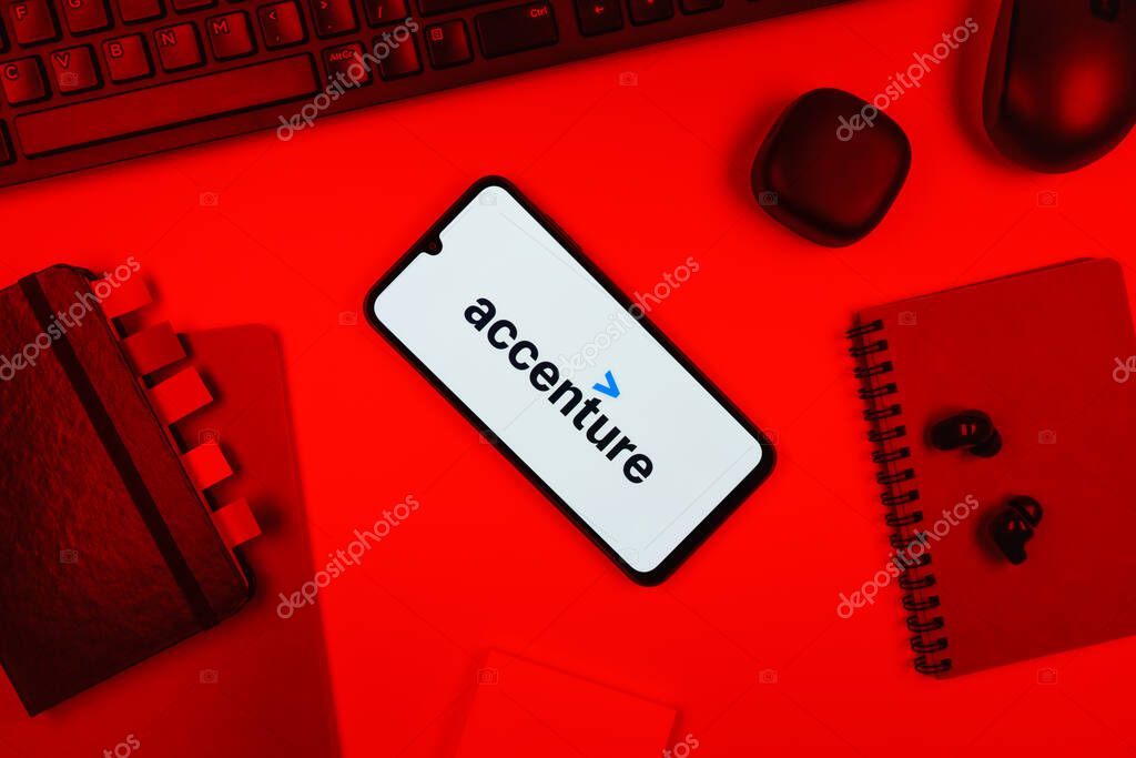 Prague, Czechia - 10 21 2024: Smartphone on surface showing Accenture logo.