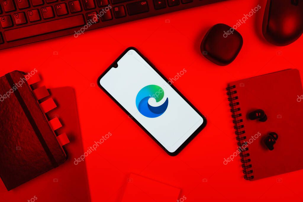 Prague, Czechia - 10 21 2024: Smartphone on surface showing Edge logo.