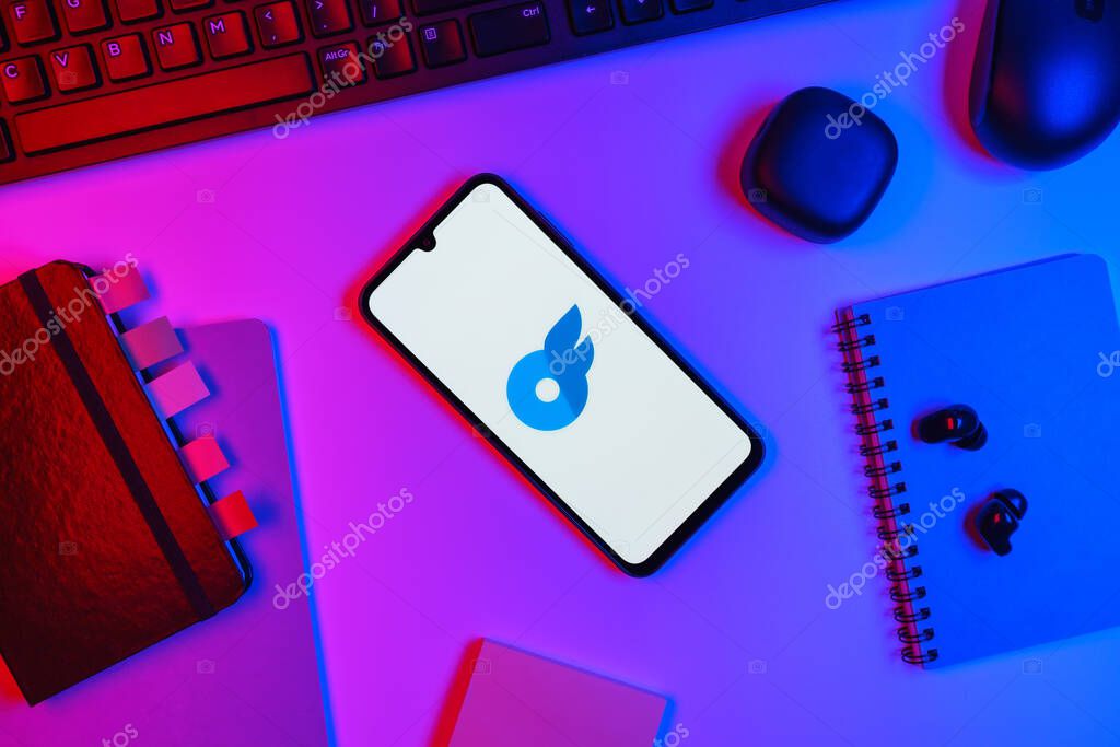 Prague, Czechia - 10 21 2024: Smartphone on surface showing OnlyFans logo.