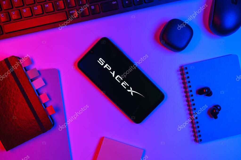 Prague, Czechia - 10 21 2024: Smartphone on surface showing SpaceX logo.