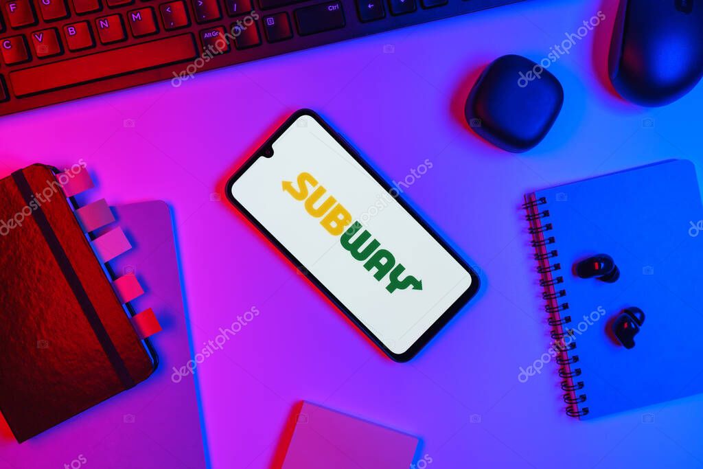 Prague, Czechia - 10 21 2024: Smartphone on surface showing Subway logo.