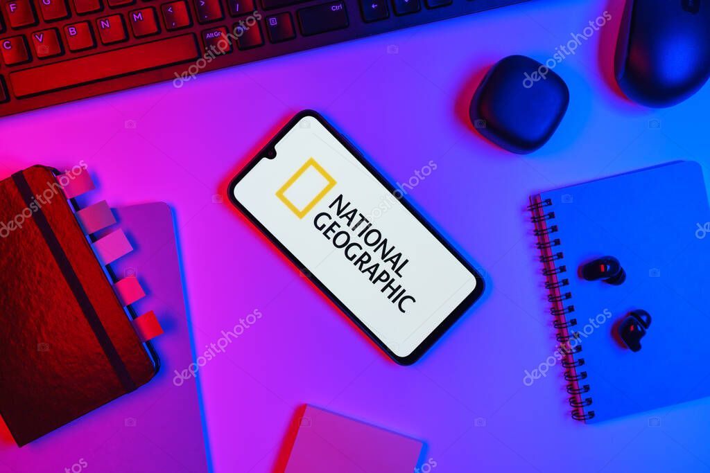 Prague, Czechia - 10 21 2024: Smartphone on surface showing National Geographic logo.