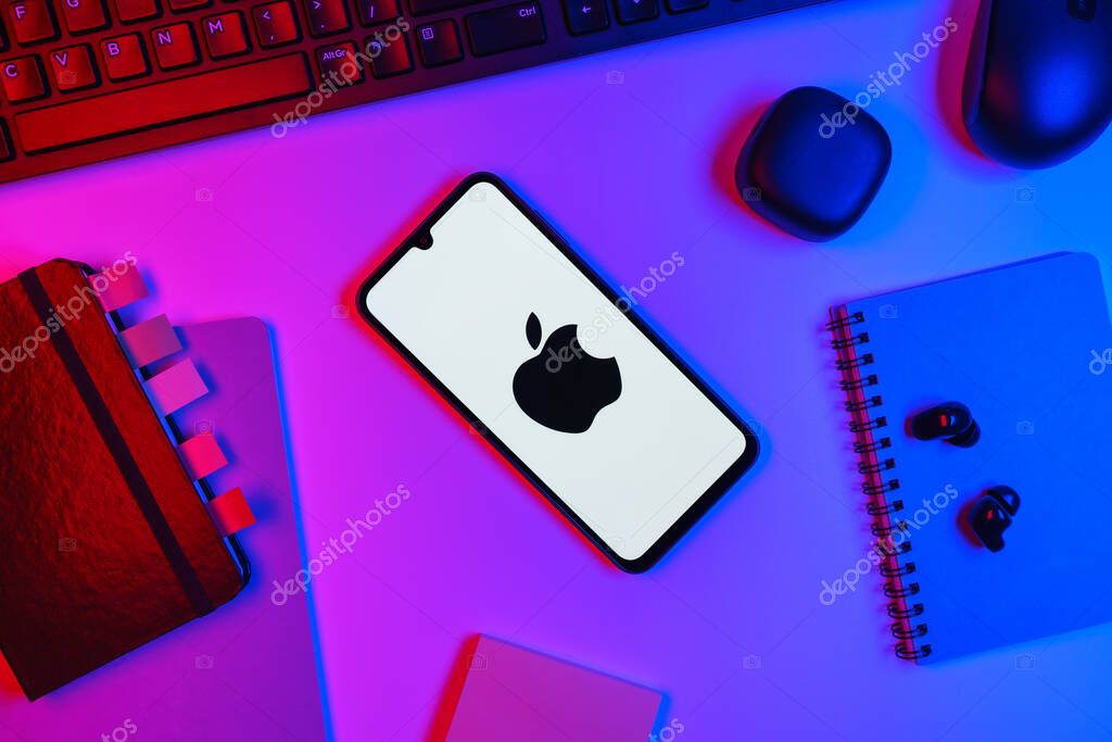 Prague, Czechia - 10 21 2024: Smartphone on surface showing Apple logo.