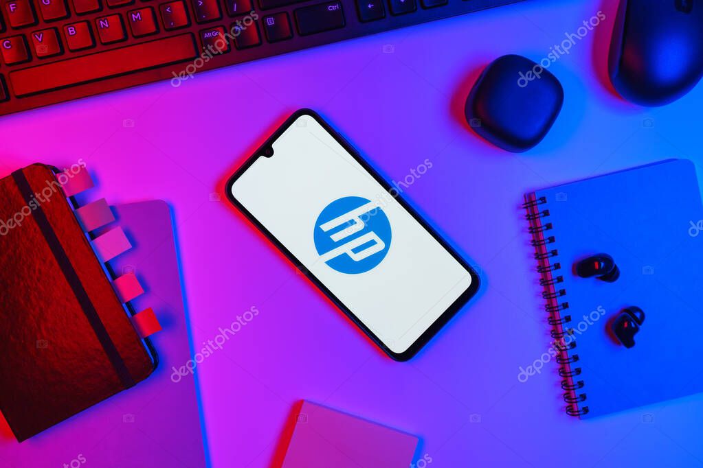 Prague, Czechia - 10 21 2024: Smartphone on surface showing Hewlett-Packard logo.