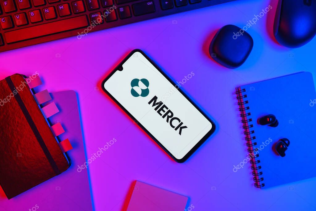 Prague, Czechia - 10 21 2024: Smartphone on surface showing Merck logo.