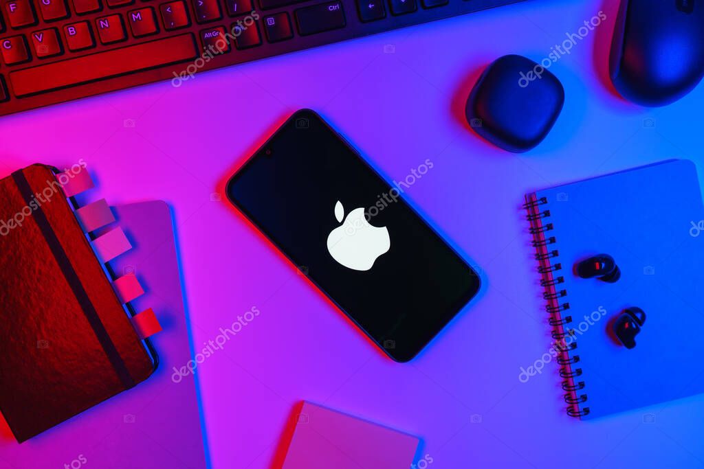 Prague, Czechia - 10 21 2024: Smartphone on surface showing Apple logo.
