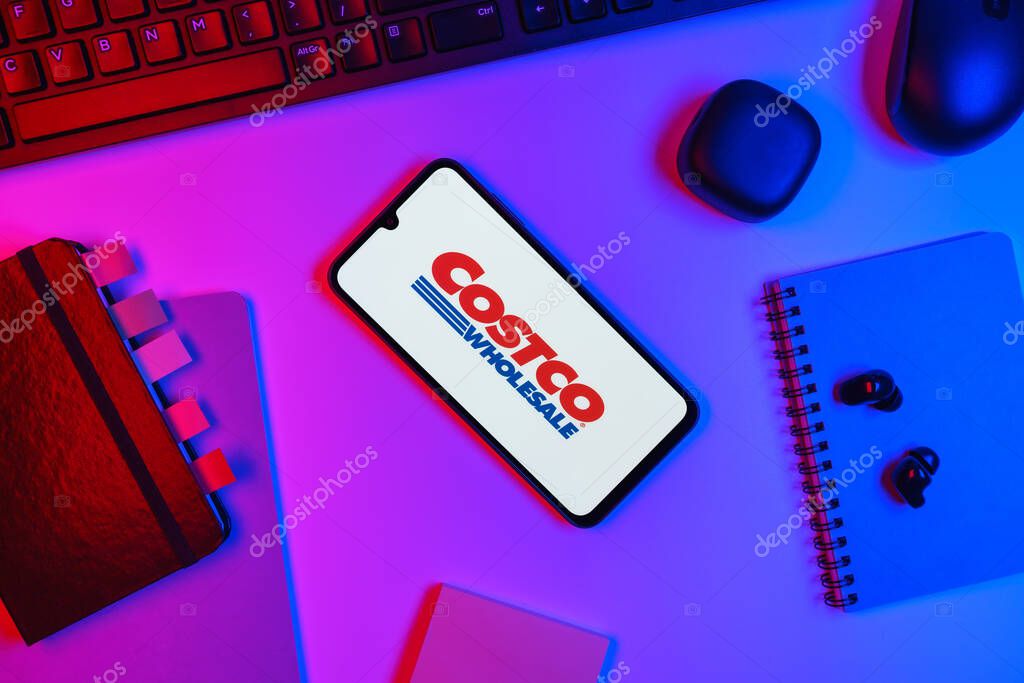 Prague, Czechia - 10 21 2024: Smartphone on surface showing Costco logo.