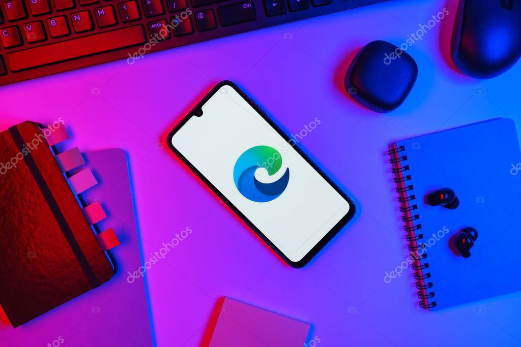 Prague, Czechia - 10 21 2024: Smartphone on surface showing Edge logo.