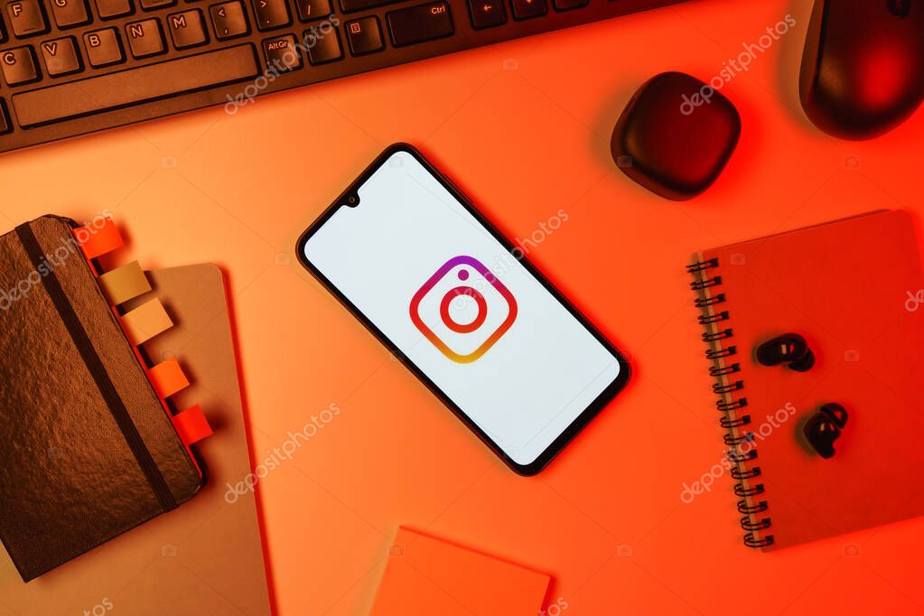 Prague, Czechia - 10 21 2024: Smartphone on surface showing Instagram logo.