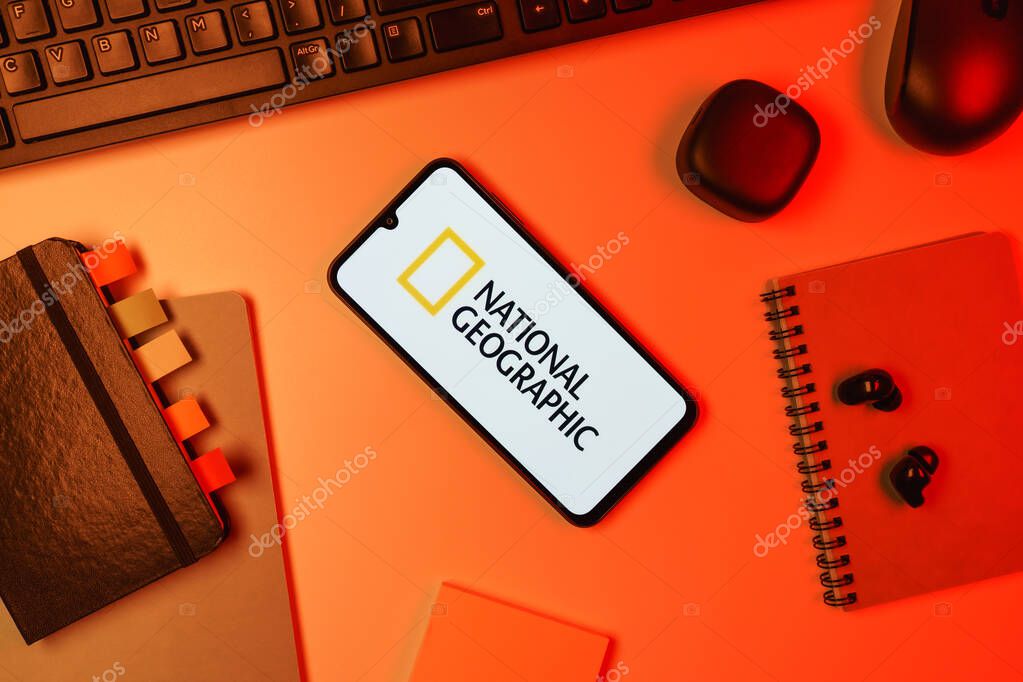 Prague, Czechia - 10 21 2024: Smartphone on surface showing National Geographic logo.