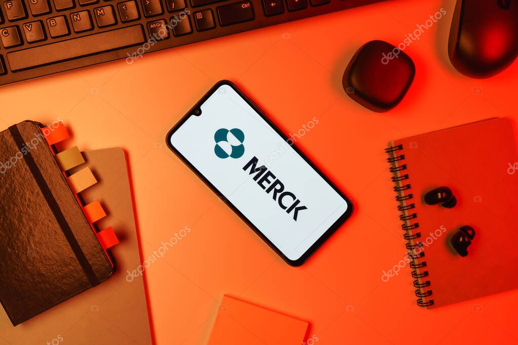 Prague, Czechia - 10 21 2024: Smartphone on surface showing Merck logo.