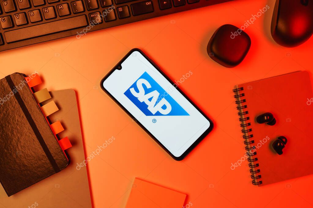 Prague, Czechia - 10 21 2024: Smartphone on surface showing SAP logo.