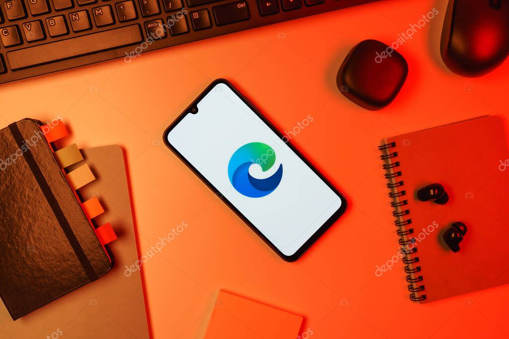 Prague, Czechia - 10 21 2024: Smartphone on surface showing Edge logo.