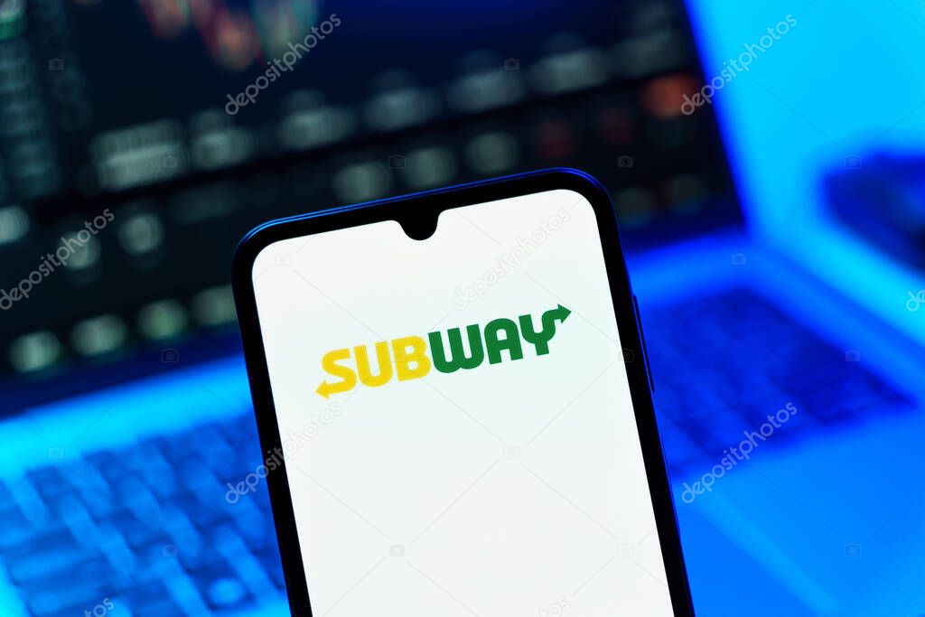 Prague, Czechia - 10 21 2024: Smartphone on surface showing Subway logo.