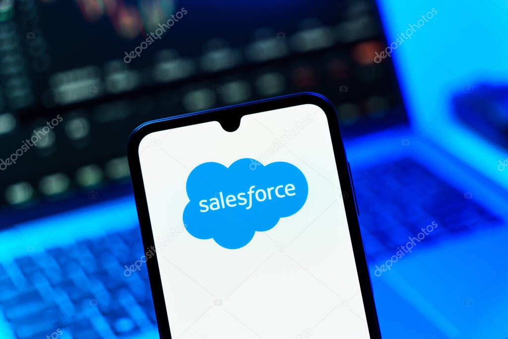 Prague, Czechia - 10 21 2024: Smartphone on surface showing Salesforce logo.