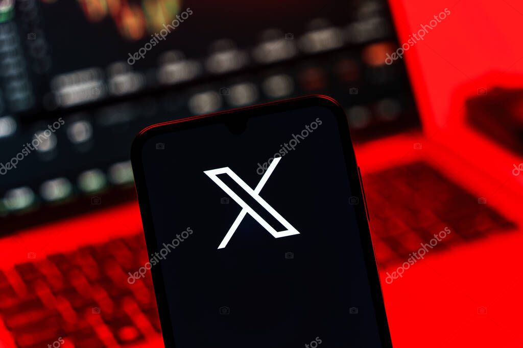 Prague, Czechia - 10 21 2024: Smartphone on surface showing X logo.