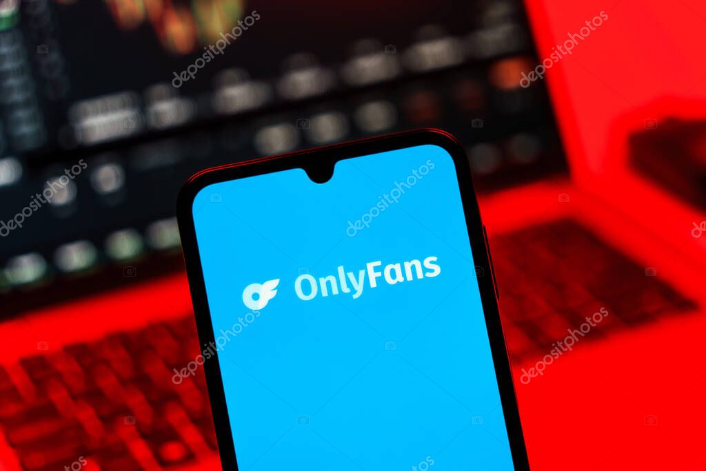 Prague, Czechia - 10 21 2024: Smartphone on surface showing OnlyFans logo.