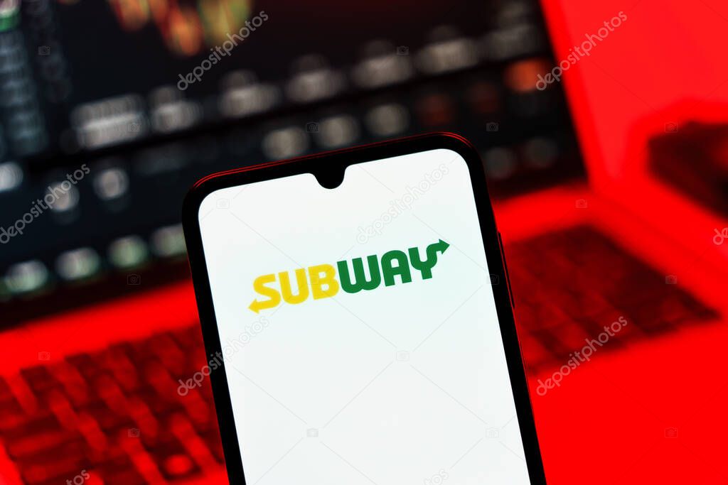 Prague, Czechia - 10 21 2024: Smartphone on surface showing Subway logo.