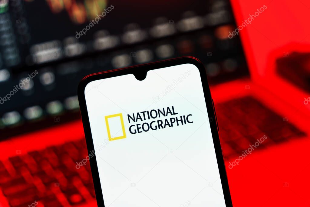 Prague, Czechia - 10 21 2024: Smartphone on surface showing National Geographic logo.
