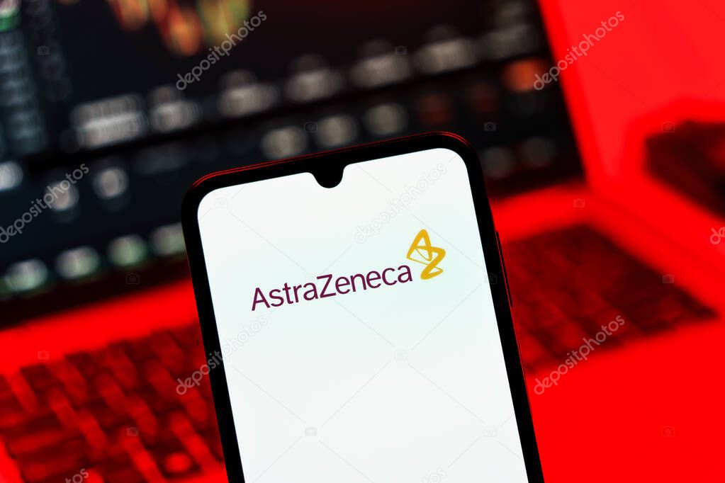 Prague, Czechia - 10 21 2024: Smartphone on surface showing AstraZeneca logo.