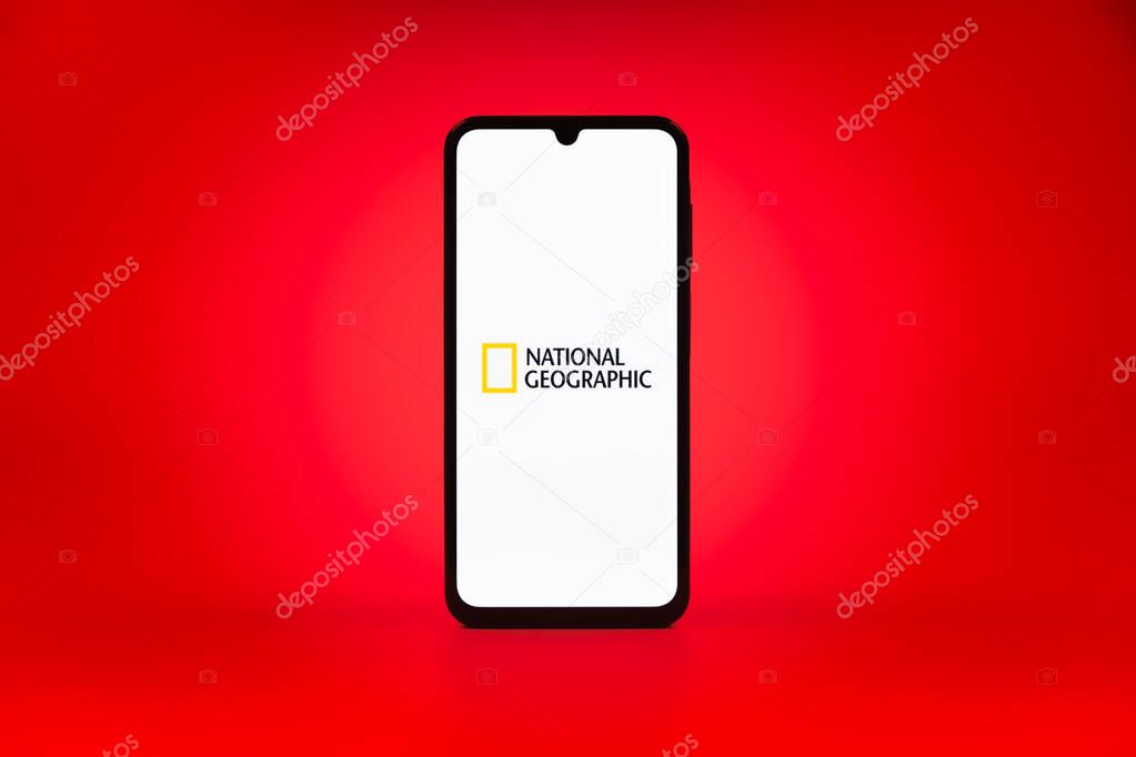 Prague, Czechia - 10 21 2024: Smartphone on surface showing National Geographic logo.