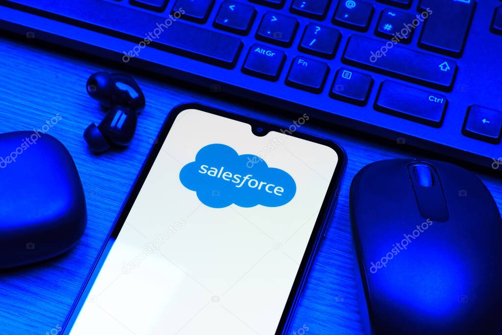 Prague, Czechia - 10 21 2024: Smartphone on surface showing Salesforce logo.