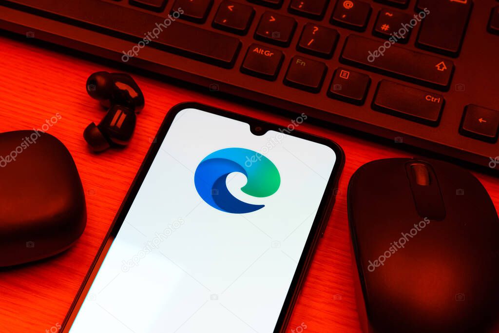 Prague, Czechia - 10 21 2024: Smartphone on surface showing Edge logo.