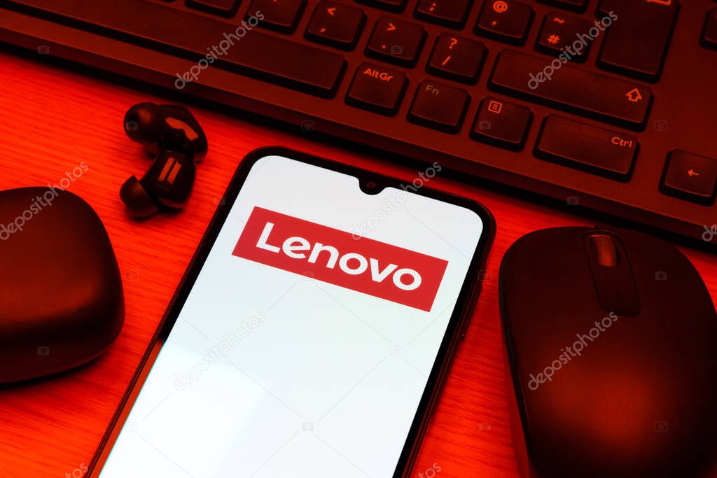 Prague, Czechia - 10 21 2024: Smartphone on surface showing Lenovo logo.
