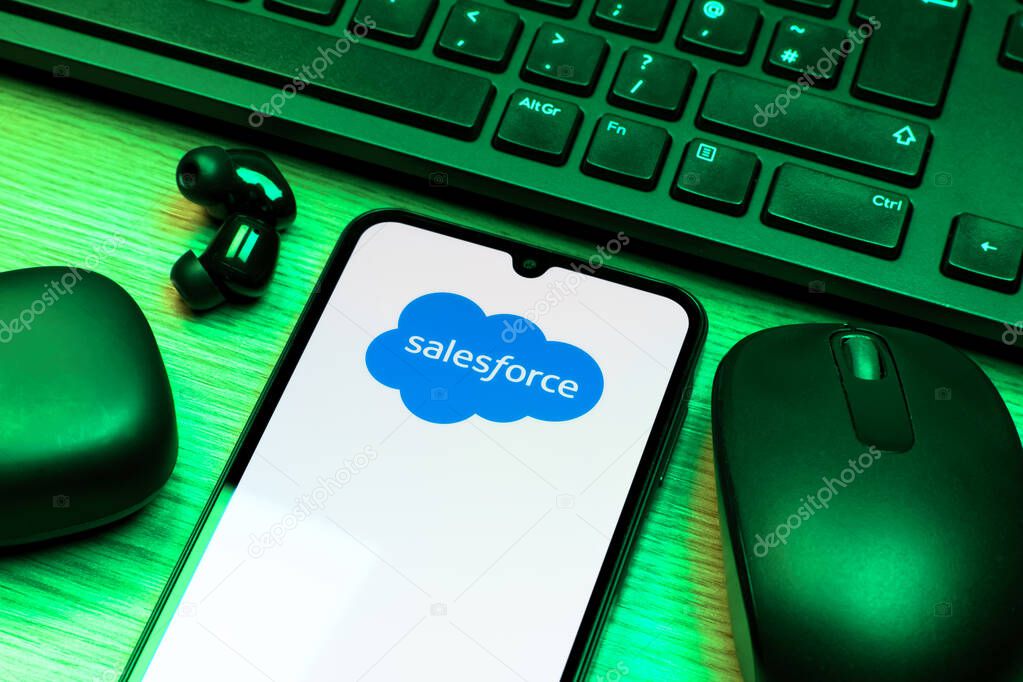 Prague, Czechia - 10 21 2024: Smartphone on surface showing Salesforce logo.