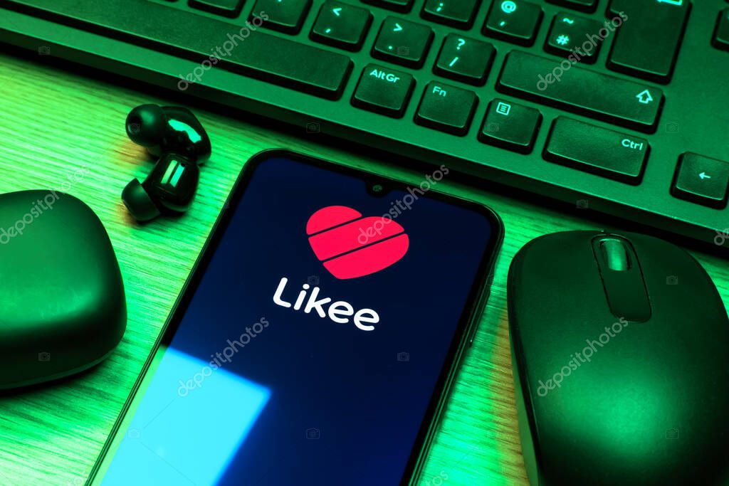 Prague, Czechia - 10 21 2024: Smartphone on surface showing Likee logo.