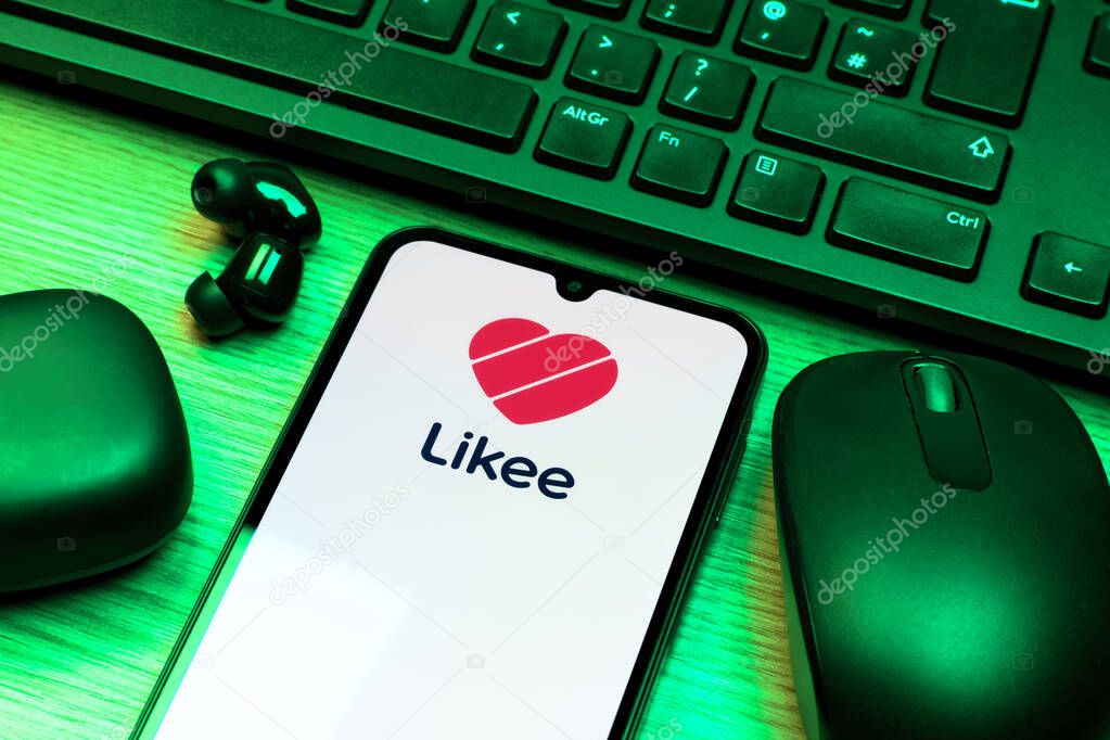 Prague, Czechia - 10 21 2024: Smartphone on surface showing Likee logo.